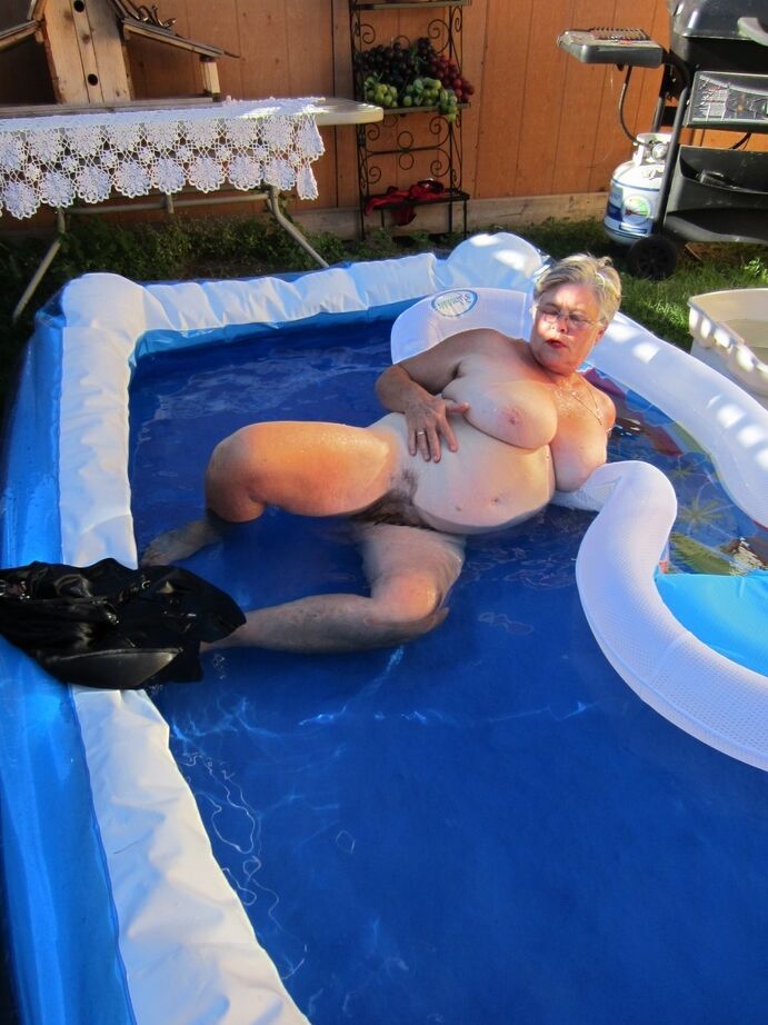 20P Fatty mature granny Girdle Goddess peels to enjoy wading pool skinny dip