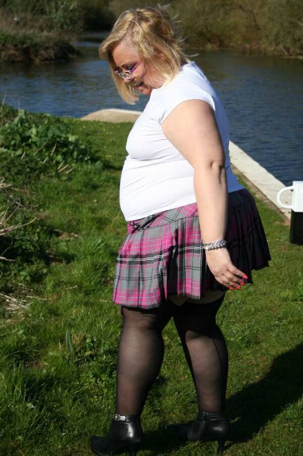 20P Fat amateur Lexie Vummings wears an anal plug during upskirt action by a river