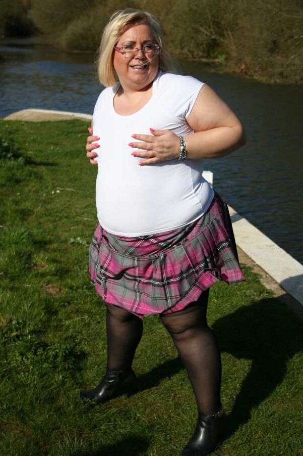 20P Fat amateur Lexie Vummings wears an anal plug during upskirt action by a river