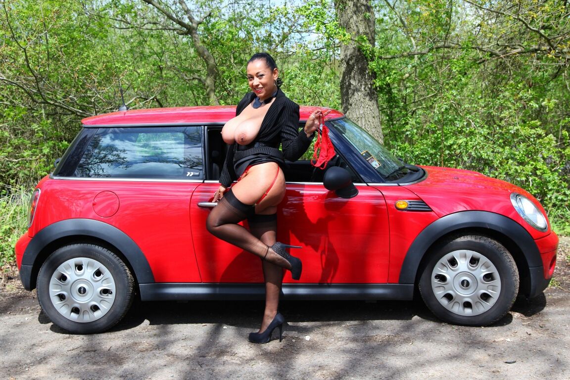 13P Older lady Danica Collins shows her big tits and bush while broke down on road