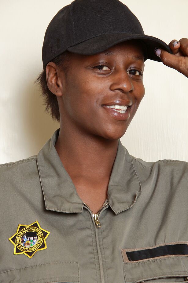 16P 30 plus black woman Entice disrobes to sock and runners in a ball cap