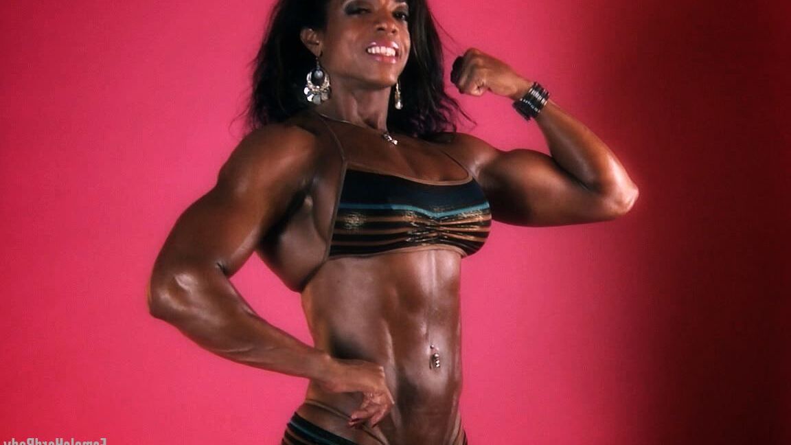 15P Black bodybuilder Alexis Ellis bares her tight ass while flexing her muscles