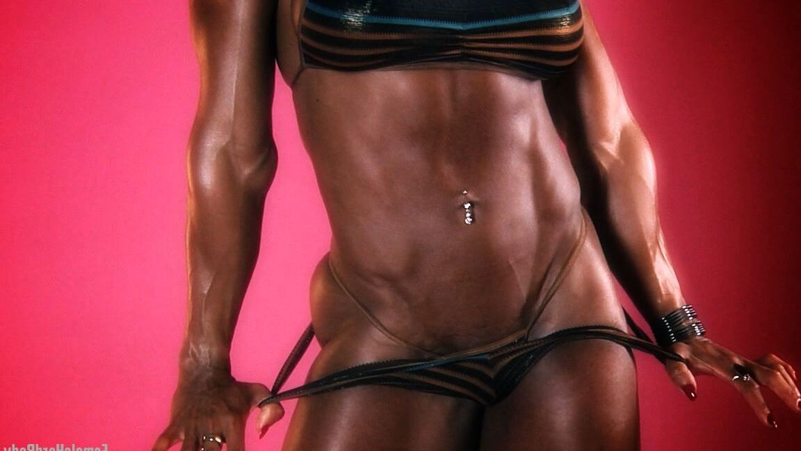 15P Black bodybuilder Alexis Ellis bares her tight ass while flexing her muscles