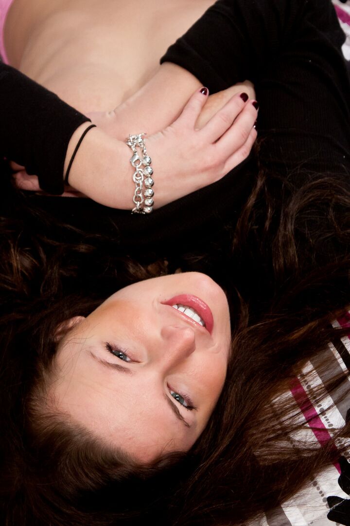 16P Brunette erotic model Kendra Rain teasing with big tits wearing thong panties