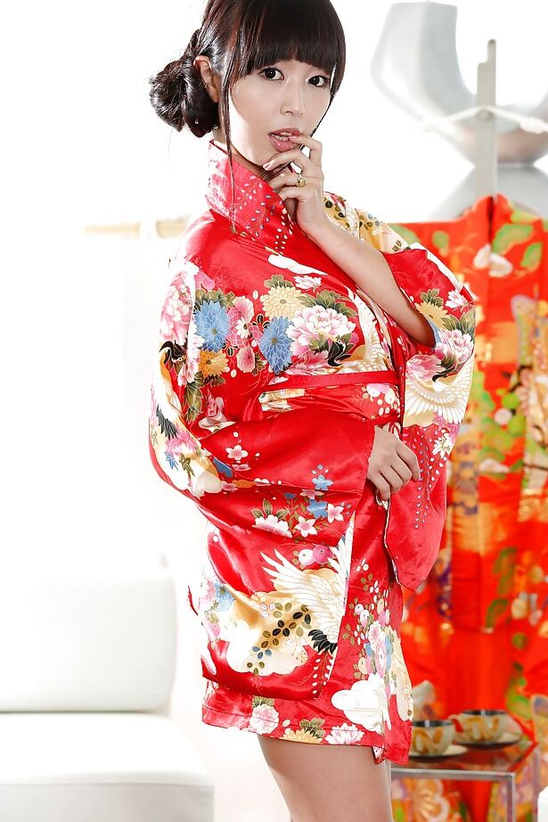 16P Japanese babe Marica Hase does a slow striptease out of Geisha uniform