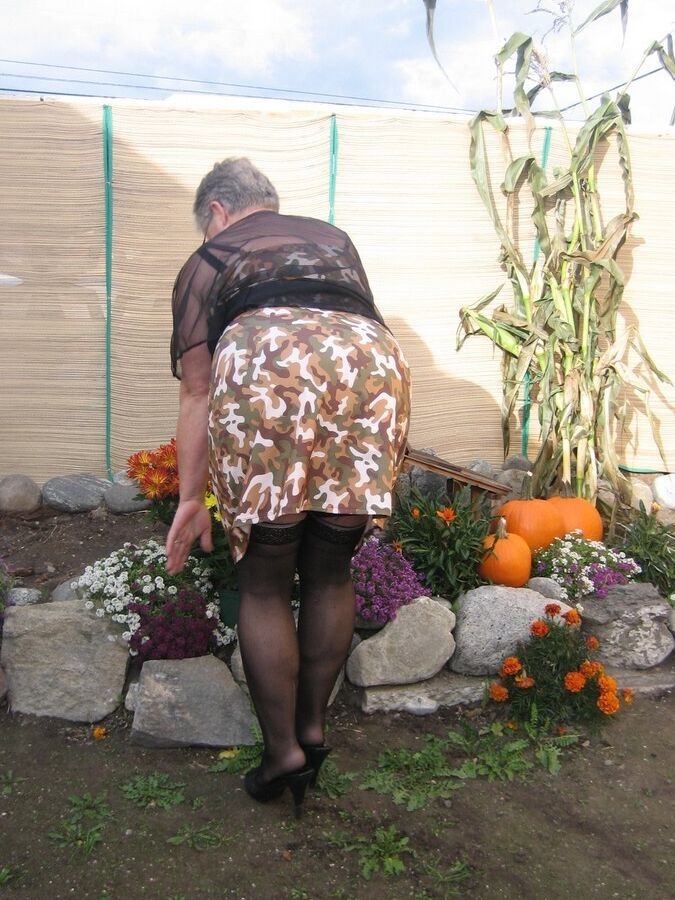 20P Fat nan Girdle Goddess sets her saggy boobs free of a girdle in the backyard