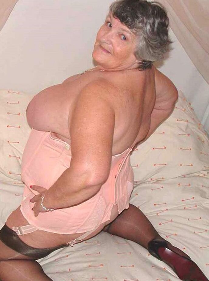 20P Fat British man Grandma Libby models varying sets of underthings at home