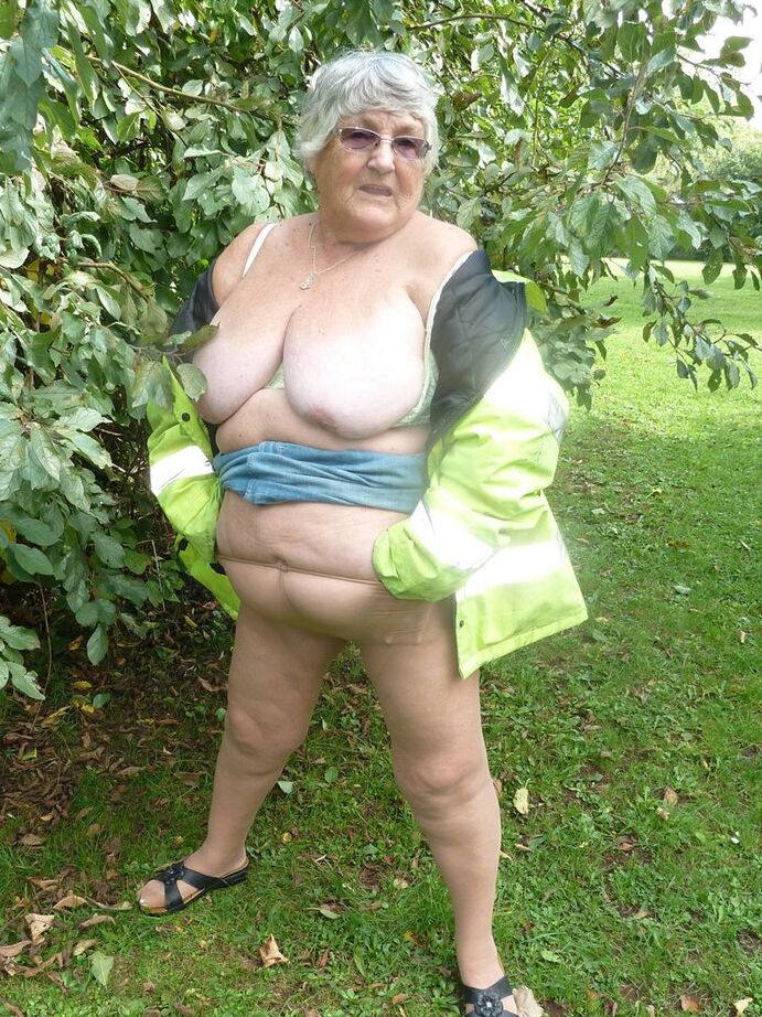 20P Fat British woman Grandma Libby exposes herself by a tree in a park