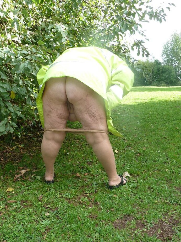 20P Fat British woman Grandma Libby exposes herself by a tree in a park