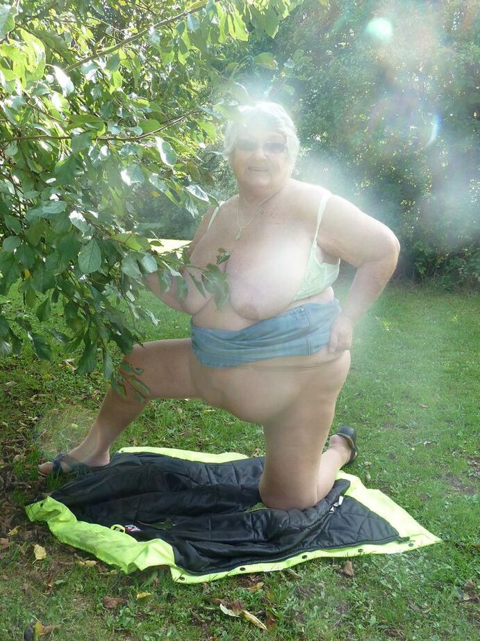 20P Fat British woman Grandma Libby exposes herself by a tree in a park