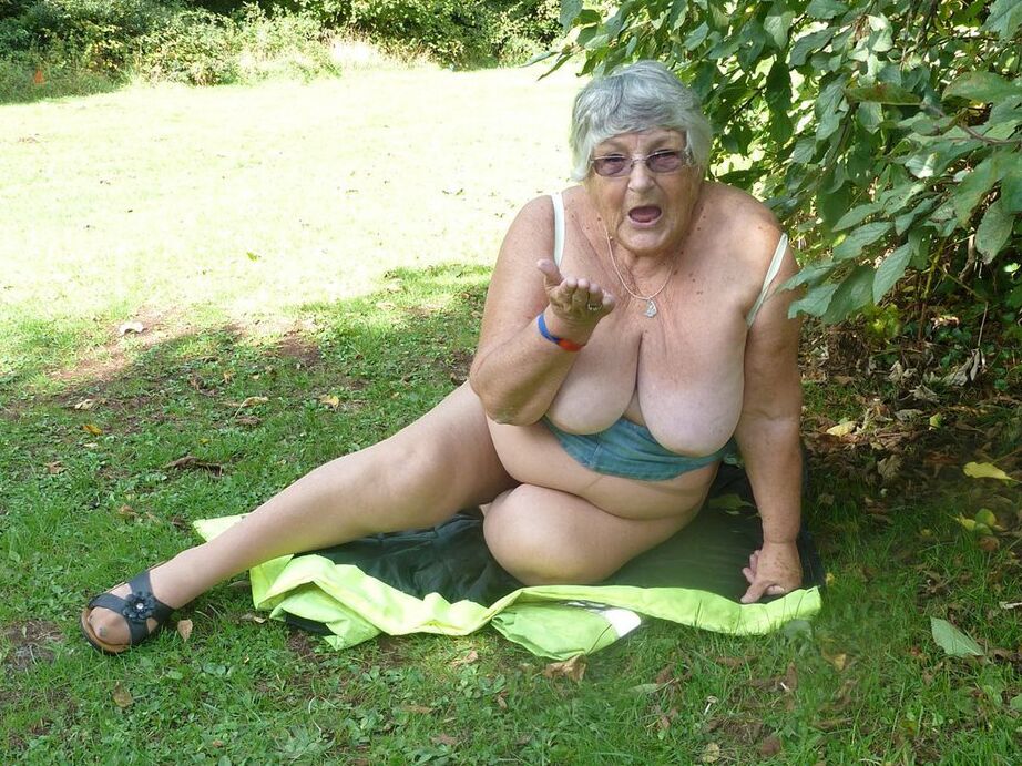 20P Fat British woman Grandma Libby exposes herself by a tree in a park