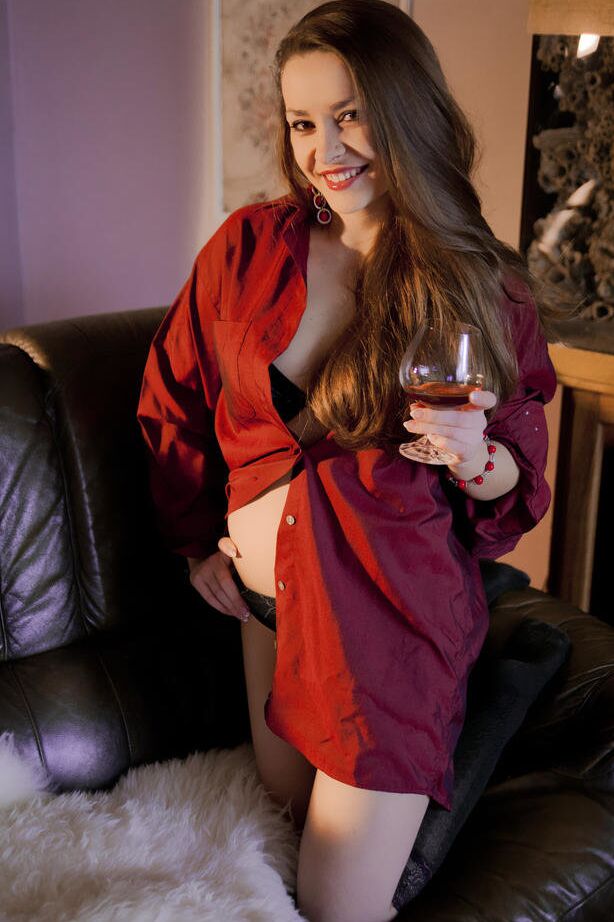 18P Solo model poses in just her knee high nylons after some wine