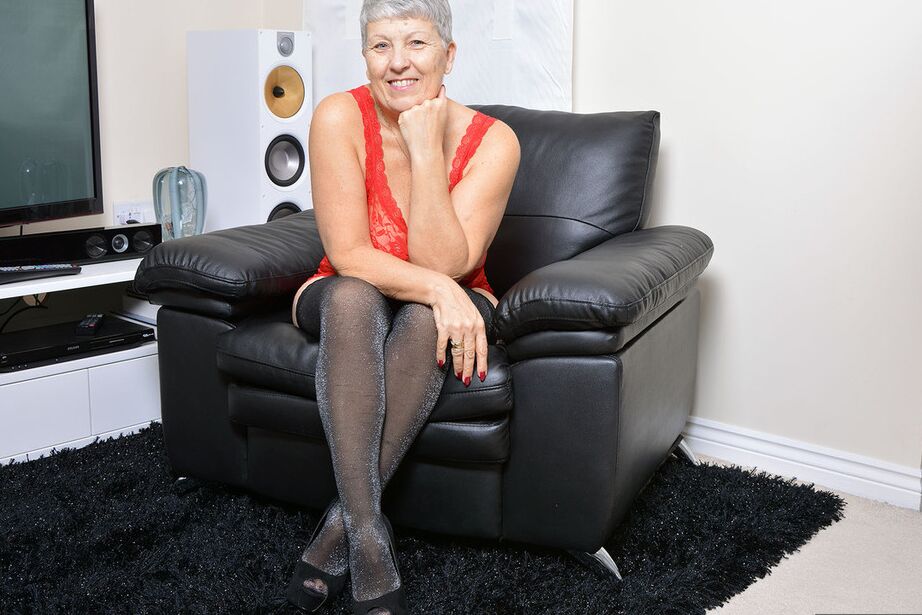 20P Short haired nan Savana sets forth her big naturals before modeling lingerie
