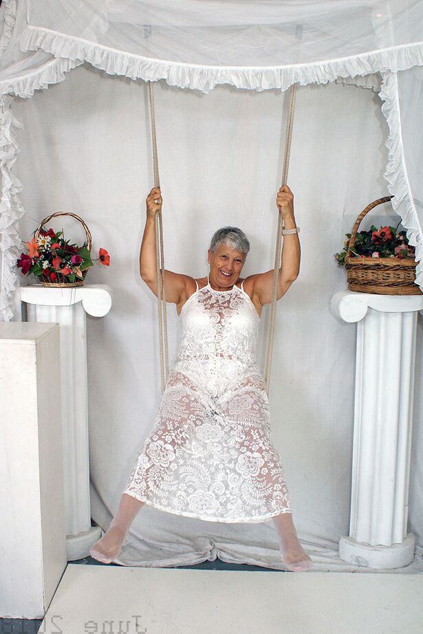 20P Short haired oma Savana models all white lingerie and hosiery on a swing