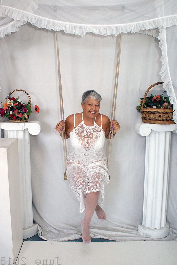 20P Short haired oma Savana models all white lingerie and hosiery on a swing