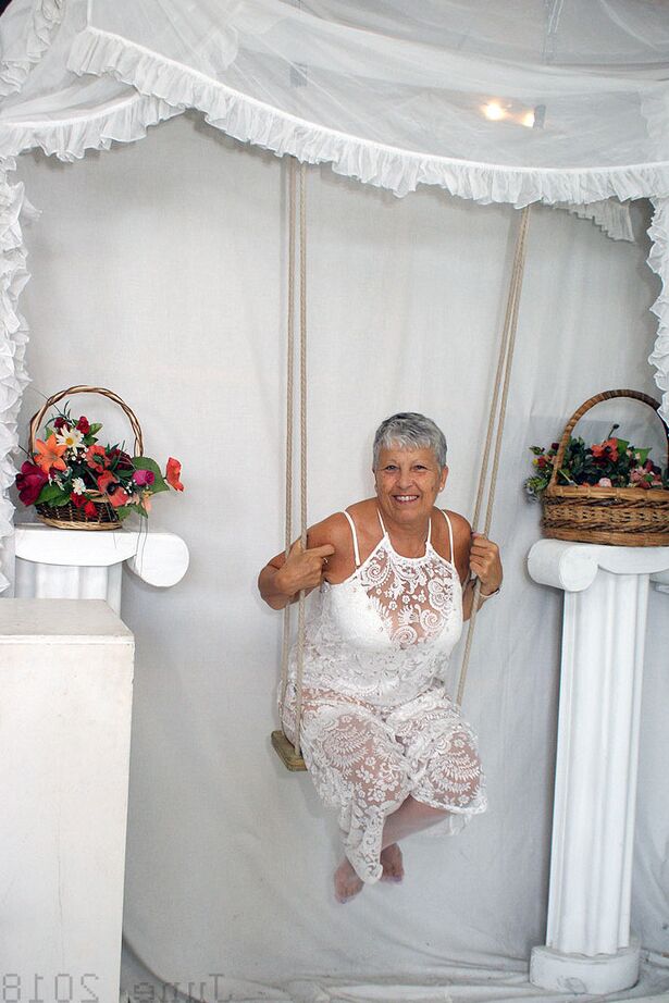 20P Short haired oma Savana models all white lingerie and hosiery on a swing