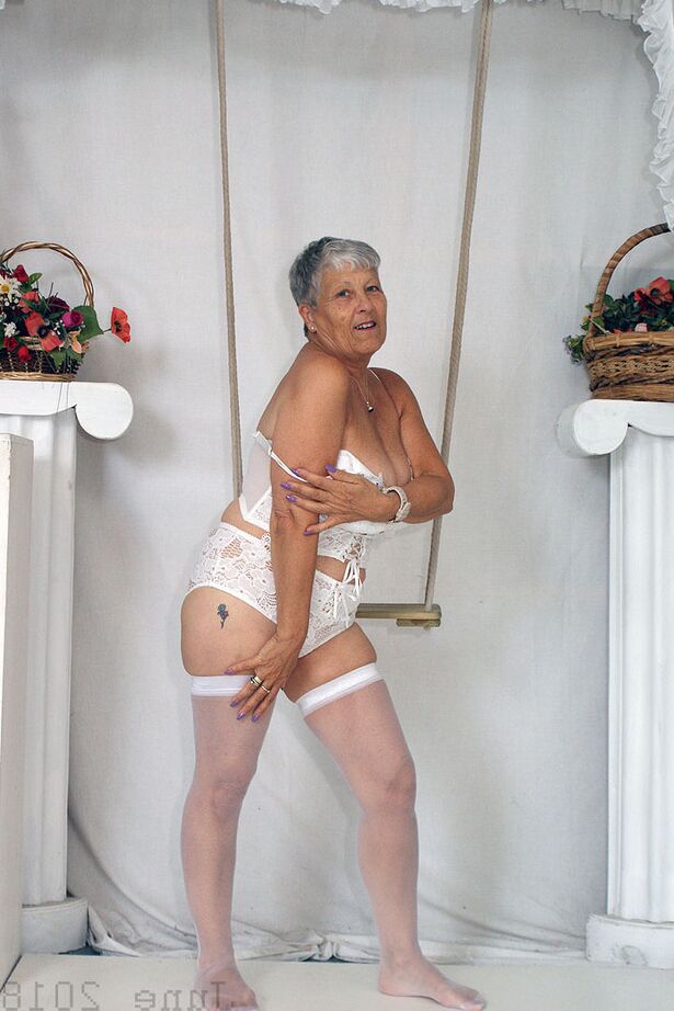 20P Short haired oma Savana models all white lingerie and hosiery on a swing