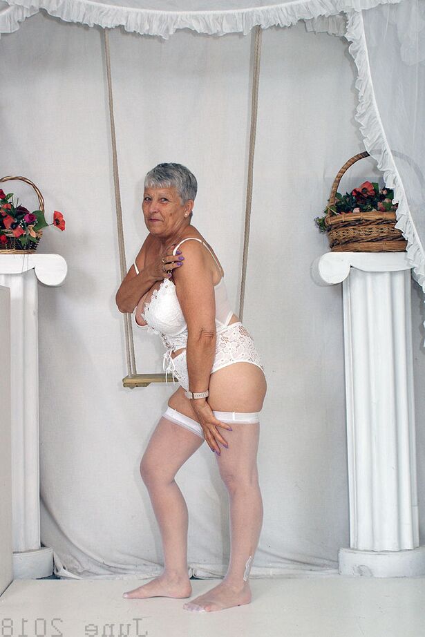20P Short haired oma Savana models all white lingerie and hosiery on a swing