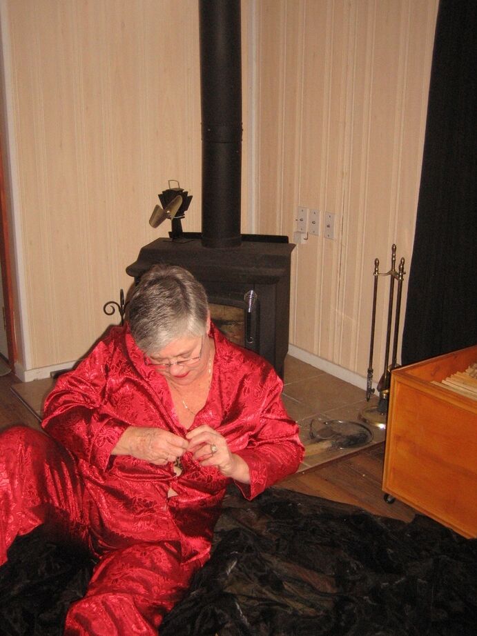 20P Old amateur Girdle Goddess gets naked in front of a parlour stove