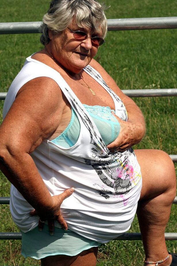 20P Old British woman Grandma Libby exposes herself next to a field of cattle