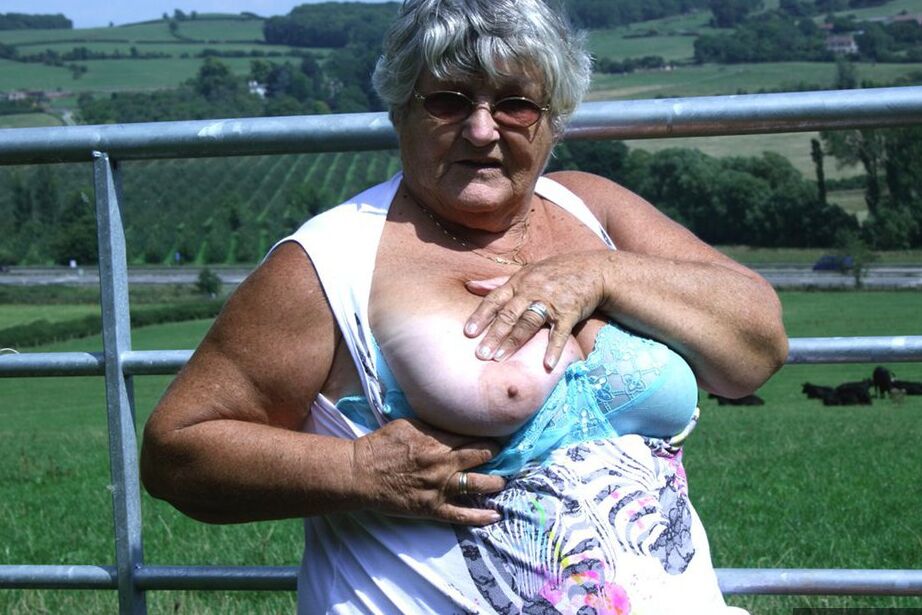 20P Old British woman Grandma Libby exposes herself next to a field of cattle