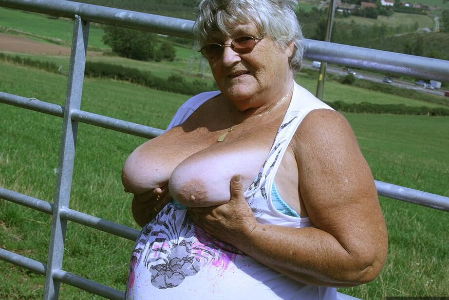 20P Old British woman Grandma Libby exposes herself next to a field of cattle