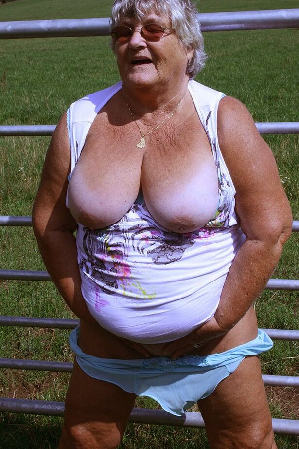 20P Old British woman Grandma Libby exposes herself next to a field of cattle