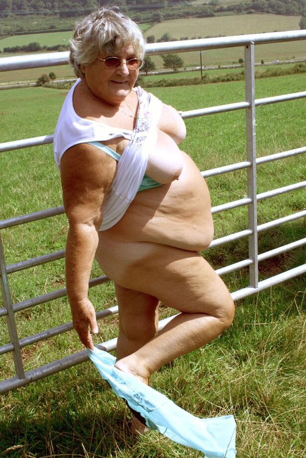 20P Old British woman Grandma Libby exposes herself next to a field of cattle