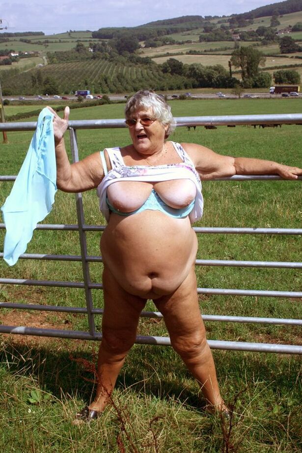 20P Old British woman Grandma Libby exposes herself next to a field of cattle