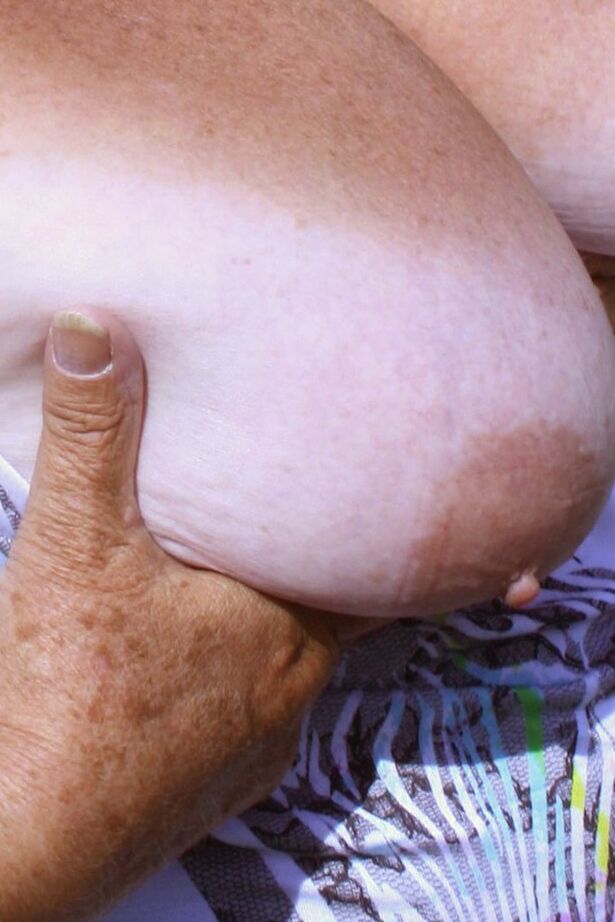 20P Old British woman Grandma Libby exposes herself next to a field of cattle