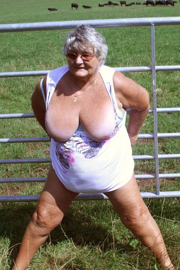 20P Old British woman Grandma Libby exposes herself next to a field of cattle