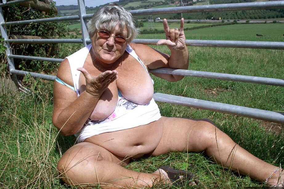 20P Old British woman Grandma Libby exposes herself next to a field of cattle