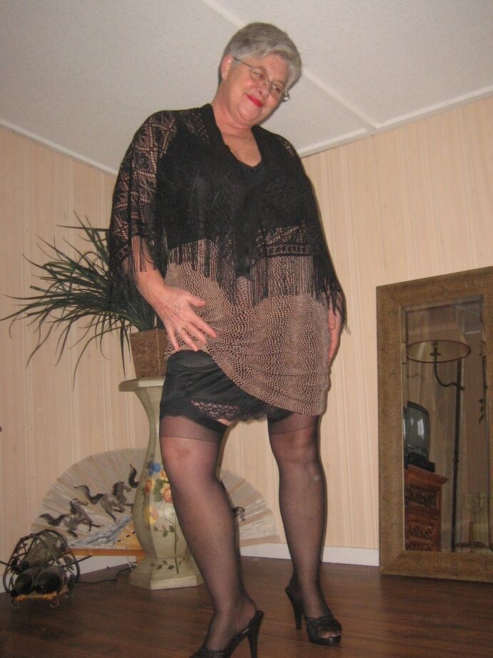 20P Fat granny unleashes her huge breasts before flashing no panty upskirt