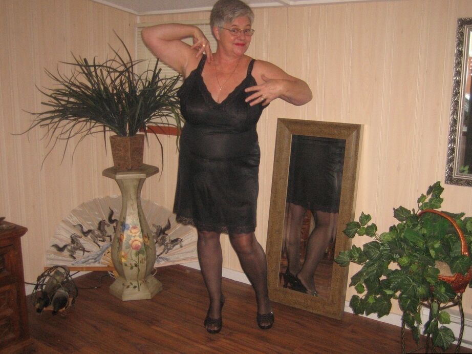 20P Fat granny unleashes her huge breasts before flashing no panty upskirt