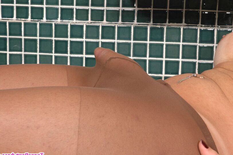 20P Lewd shemale in control top pantyhose fondling her dick right on the lounge