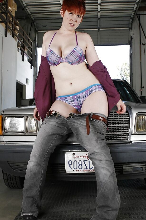 16P Short-haired redhead in jeans slowly uncovering her curvy body