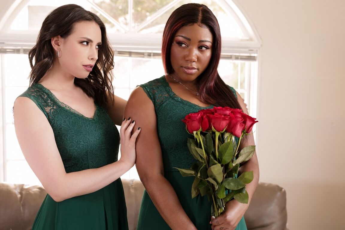 15P Chanell Heart, a bridesmaid, is sitting on a couch and looking downhearted Her