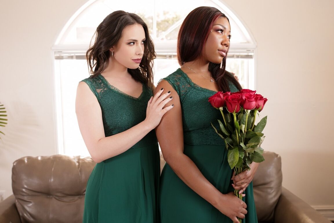 15P Chanell Heart, a bridesmaid, is sitting on a couch and looking downhearted Her