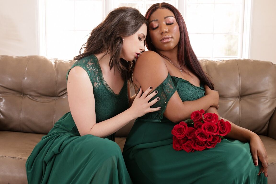 15P Chanell Heart, a bridesmaid, is sitting on a couch and looking downhearted Her