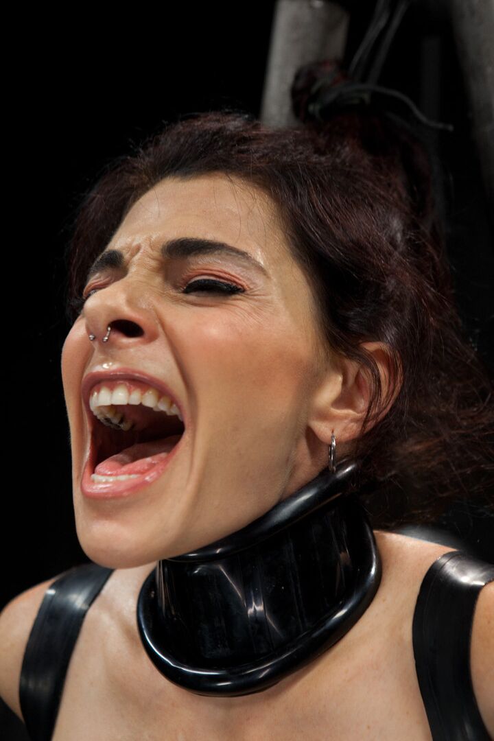21P Mature Annika flaunts her big juggs while getting abused on a torture device