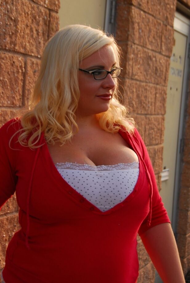 16P Fatty blonde in glasses smoking and stripping off her clothes