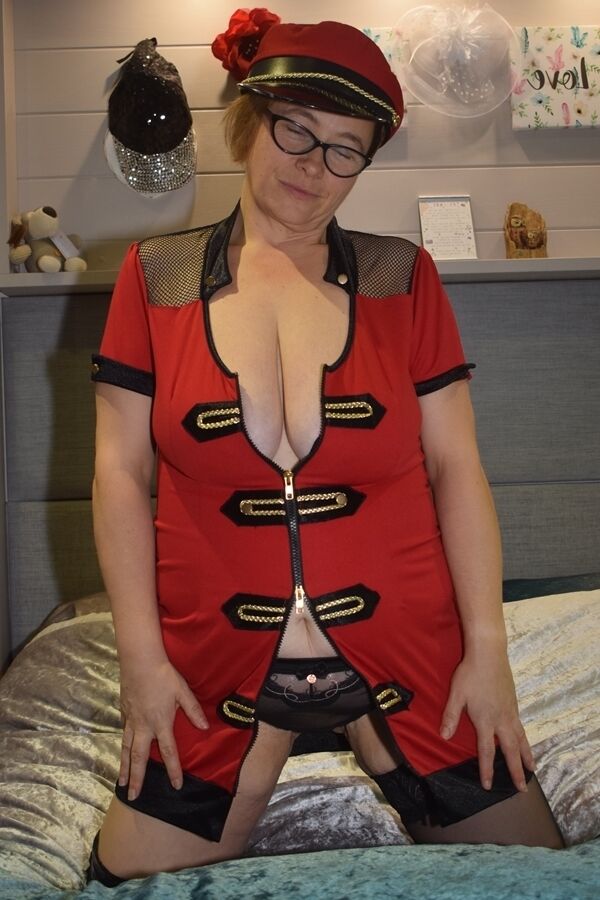 20P Older first timer looses her saggy breasts from her uniform on a bed