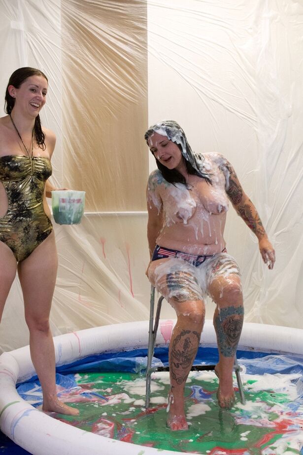 20P Amateur lesbians douse each other in gunk while in a wading pool