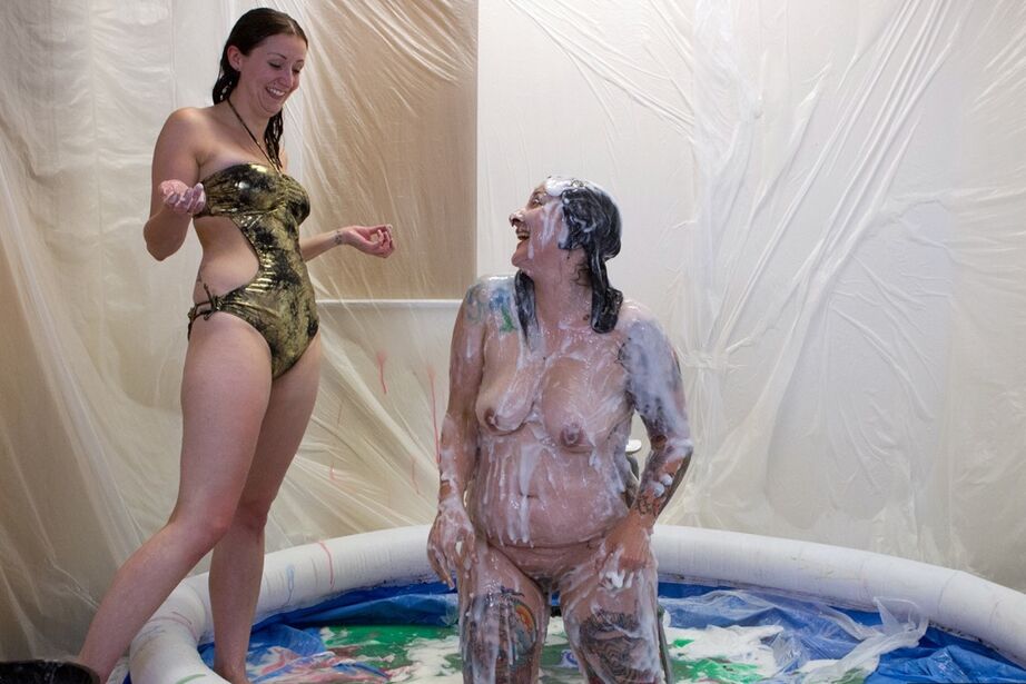 20P Amateur lesbians douse each other in gunk while in a wading pool