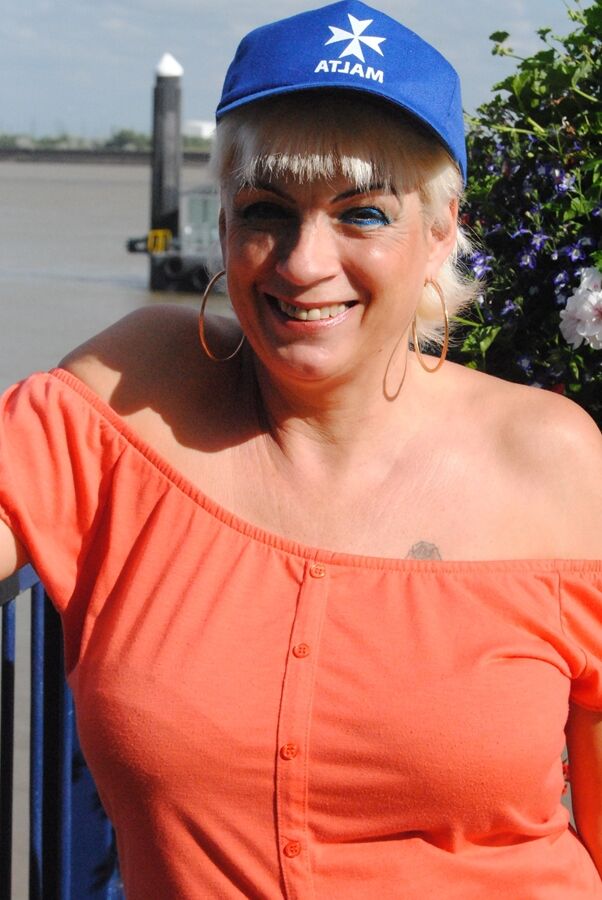 20P Middle-aged blonde Dimonty uncovers her natural tits while in public