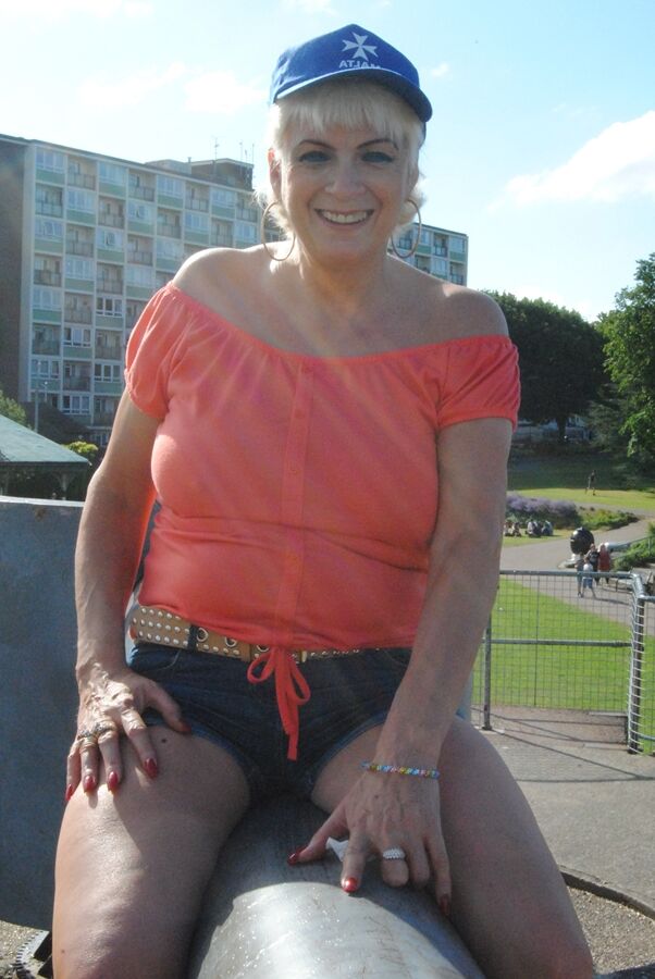 20P Middle-aged blonde Dimonty uncovers her natural tits while in public