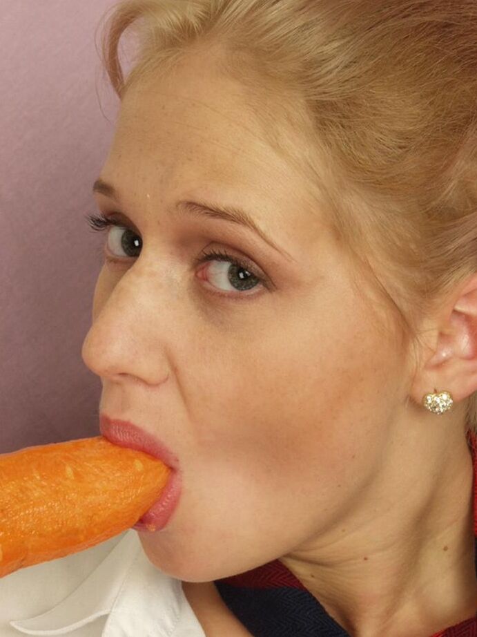 15P Blond schoolgirl puffs on a cigar prior to masturbating with a carrot