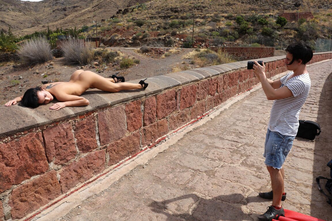 21P Raven-haired model Sapphira strips her tiny bikini & poses nude in the desert