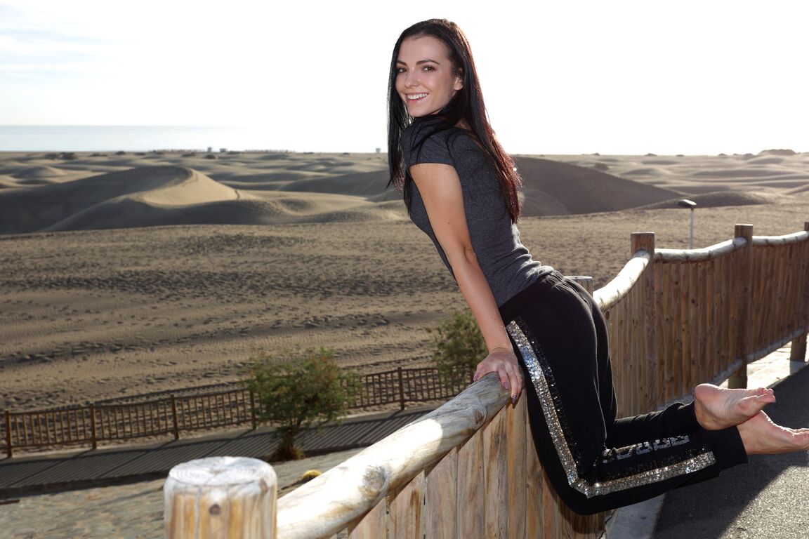 21P Raven-haired model Sapphira strips her tiny bikini & poses nude in the desert