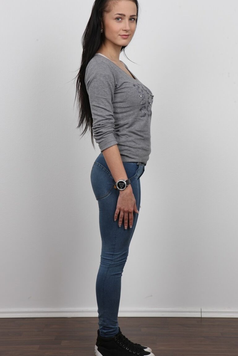 20P Amateur Denisa sits on a glass table naked to show her engorged clitoris